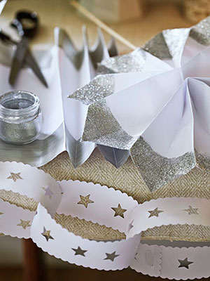 Paper star decoration with silver glitter - Make a silver paper star - Christmas decorations to make - Christmas crafts - allaboutyou.com