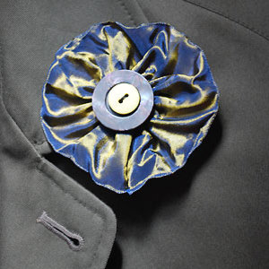 make a ribbon and button brooch