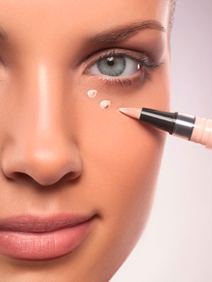 Woman applying concealer - makeup tips - fashion & beauty - allaboutyou.com