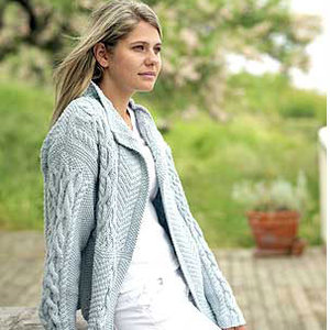 Model wearing patchwork knitted jacket
