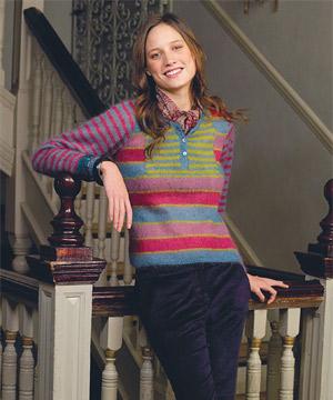 Woman wearing a multi stripe knitted sweater