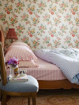 Striped duvet cover on bed; easy sewing projects from allaboutyou.com