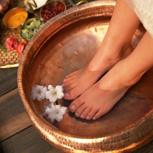 Feet soaking in brass bowl - How to do a pedicure at home - Fashion&beauty - allaboutyou.com