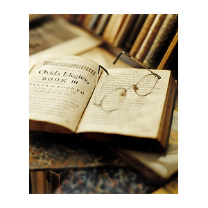 old books and glasses