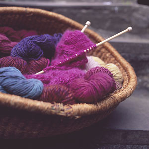 wool and knitting in basket