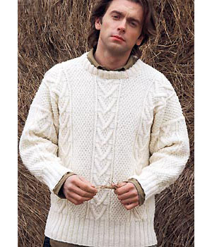 man wearing knitted Aran jumper