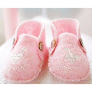 Pink cross-stitch baby booties - Make cross-stitch baby booties - Craft - allaboutyou.com
