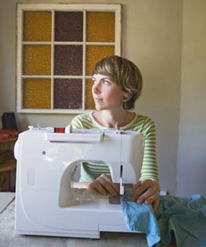 woman at a sewing machine - Best sewing books - Craft - allaboutyou.com