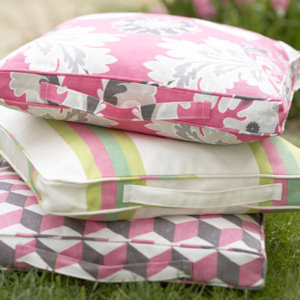 Three printed picnic cushions