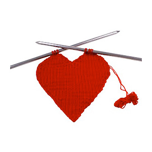red knitted heart on needles