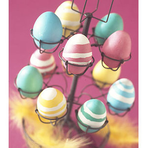 painted eggs in an egg rack - Easter egg decorating ideas - Craft - allaboutyou.com