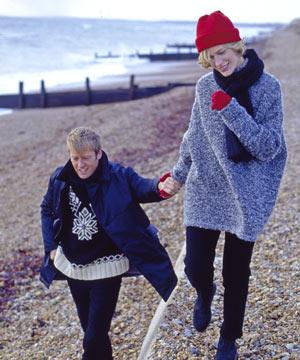 couple holding hands on winter beach - The UK's most romantic places - Country & travel - allaboutyou.com