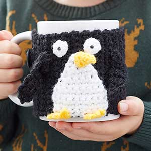 Crochet a penguin mug cosy: free crochet pattern - craft - allaboutyou.com