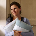 Sarah Moore holding cushions