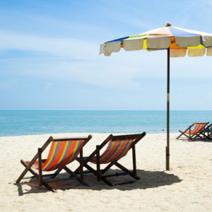 Deckchairs on a beach - Beachwear buying guide - Fashion&beauty - allaboutyou.com