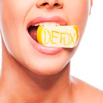 Woman eating detox apple - 10 of the best detox foods - healthy food - diet & wellbeing - allaboutyou.com