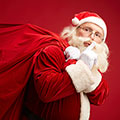 santa claus with sack of christmas gifts